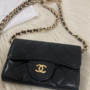 Black small coin wallet on chain